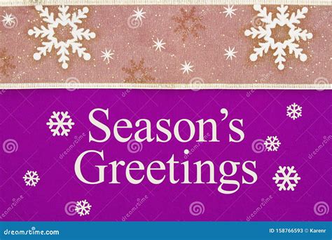 Season`s Greeting Message With Gold Snowflake Ribbon Stock Image