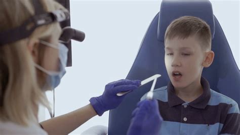 Doctor Examine Throat Of Child With Ent Telescope Stock Video Footage