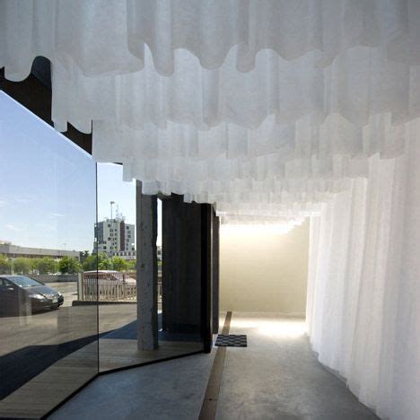 We have a long narrow bedroom and have recently put shelves and hanging rods in one end for a walk in closet of sorts. Rows of translucent fabric hanging from the ceiling - Art ...