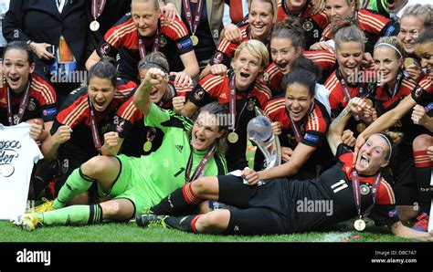 Nadine Angerer Front L And Anja Miitag Front R Of Germany Celebrate With The Team After