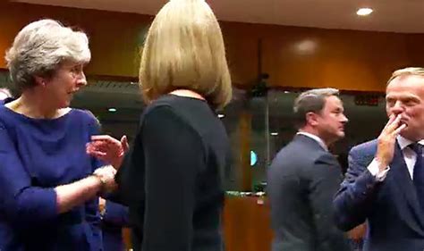 watch eu boss donald tusk blow kiss to theresa may during eu summit in brussels uk news