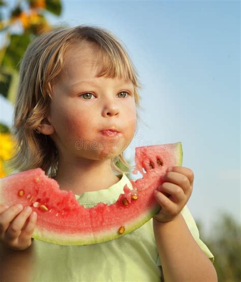 Child Eating Watermelon In The Garden Stock Image Image Of Healthy