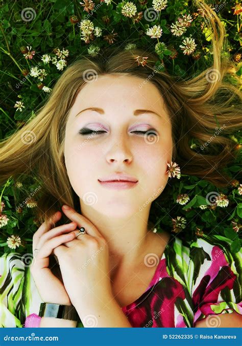 Young Beautiful Girl Lays On A Grass Stock Image Image Of Meadow