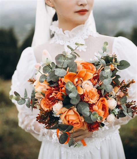 Bouquet of perfectly placed blooms of pink roses, ivory peonies blush spray roses, ranunculus and wispy greens give the bouquet fabulous composed appearance, while the soft pinks, peach and ivory blooms delights the eyes. Bridal Bouquet,Autumn Burnt Peach Orange Persimmon ...