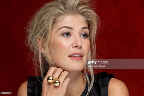 Rosamund Pike Poses For A Photo During A Portrait Session At The Park