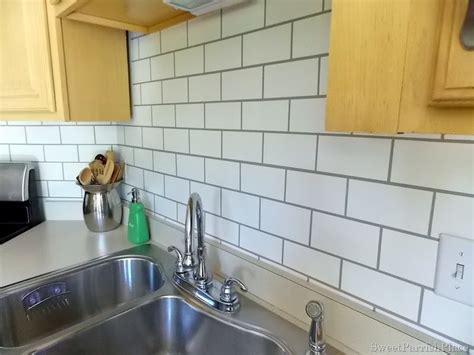 Subway tile is a classic choice for a kitchen backsplash. 50+ Wallpaper That Looks Like Tile Backsplash on ...