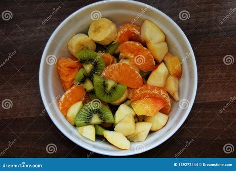Fresh Fruit Salad With Orange Kiwi Apple And Banana Stock Photo