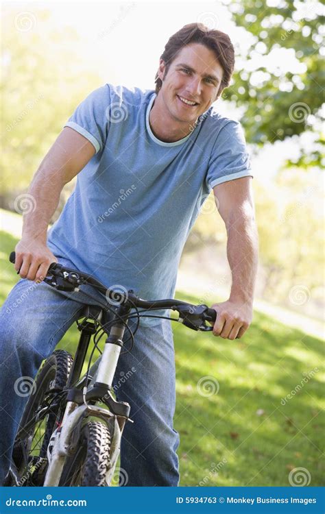 Man Outdoors On Bike Smiling Stock Image Image Of Bicycle Cycle 5934763