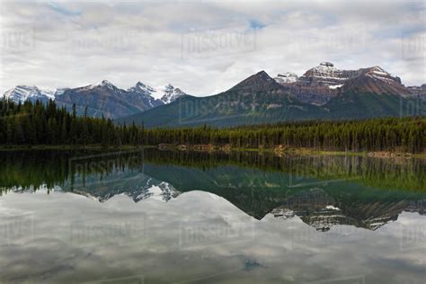 Reflection Of Clouds And Mountains In A Lake Lake Herbert Banff