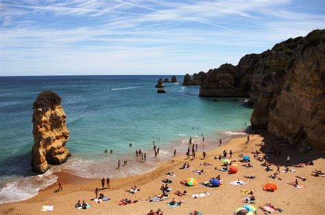 Compare prices from different websites. Praia da Dona Ana: The #1 Guide To This Beautiful Beach in ...