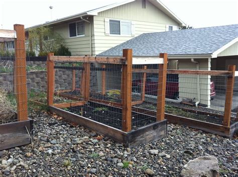 The front fence panels are fixed to the bed with heavy duty hinges, allowing you to. Raised Garden Bed with Deer Fencing | Flickr - Photo Sharing!