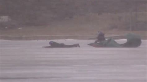 Duo Struggles To Do Parasailing On Frozen Lake Amidst Wind Storm