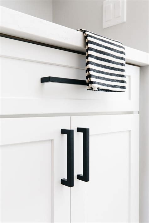 White shaker cabinets with black hardware. Our House Reveal: Master Bedroom Coffee Bar | Black kitchens, Shaker style cabinets, White ...