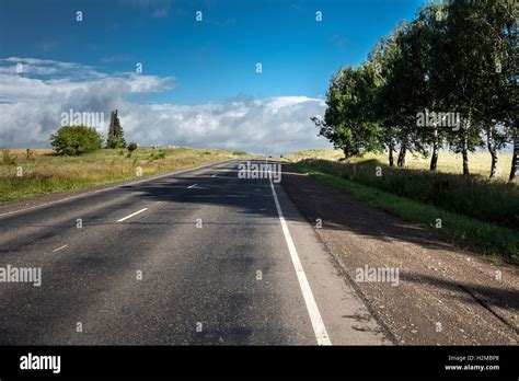 The Country Highway With A Roadside Landscape Stock Photo Alamy
