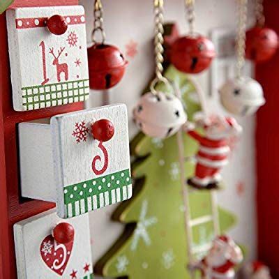 Dieser 54cm hohe adventskalender aus holz kann jedes jahr wieder mit neuen füllungen versehen werden. Amazon.de: WeRChristmas Adventskalender-Haus, Holz, 37 cm ...