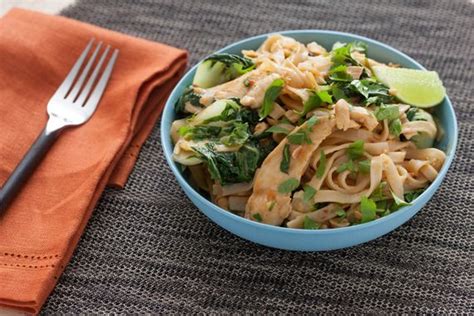 Stir Fried Chicken Pad Thai With Baby Tatsoi And Spicy Peanut Sauce