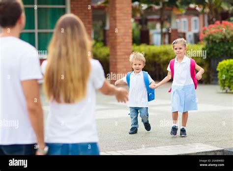 Student Picking Up School Bag Hi Res Stock Photography And Images Alamy