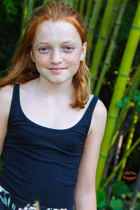 Ginger Hair Pre Teen Young Girl With Lots Of Freckels