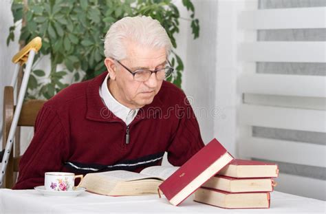 Senior Man Relaxing With Book Stock Image Image Of Book Camera 5116781