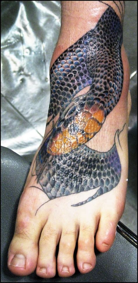 Snake tattoos positioned on one's ankle tend to be pointing up. 30 Scary Snake Tattoos - SloDive