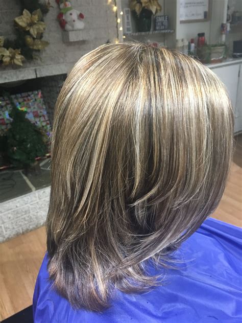 Highlights inherently add a level of volume and depth to hair that wasn't there before; Medium Brown Hair with light brown and blonde highlights ...