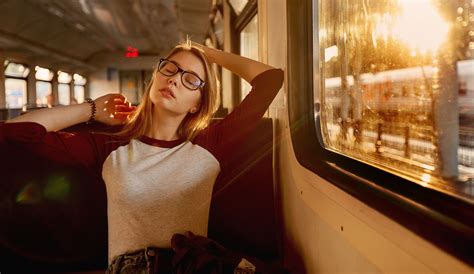 Women With Glasses Closed Eyes Sitting In Train Wallpaper Hd Girls Wallpapers 4k Wallpapers