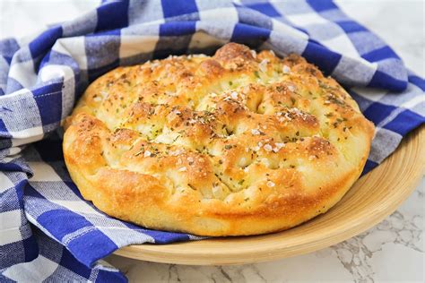 Focaccia is a popular italian yeast bread which is sometimes compared to pizza, because both are flat breads. Easy Homemade Focaccia Bread Recipe | Lil' Luna