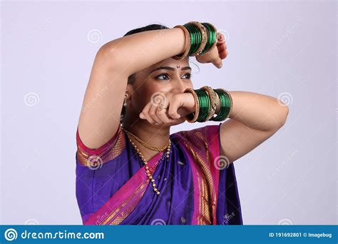 Beautiful Indian Women Wearing Saree Showing Hand Gestures While Smiling Stock Image