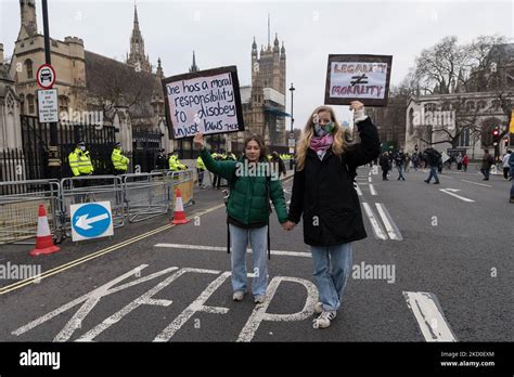 london united kingdom january 15 2022 protesters demonstrate outside houses of parliament