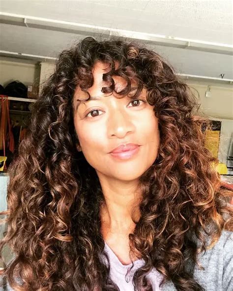 25 Best Ways To Style Curly Hair With Bangs Styledope