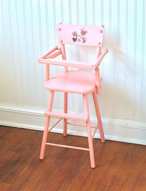 Since baby dolls are a great way for kids to learn all about how to take care of others, your kid might need a baby doll high chair. Circa 1950s Pink Wooden Doll High Chair Cass Teddy Bear ...