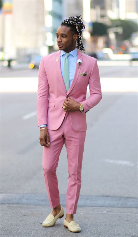 Love the styling with the sneakers, its such a great way to dress it down! OOTD: PINK SUIT FOR THE SUMMER - Norris Danta Ford