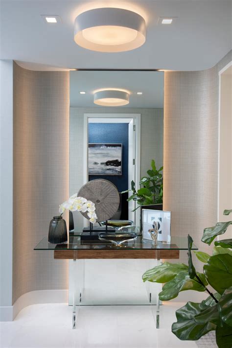 Modern Foyer With Glass Table And Recessed Lighting Hgtv