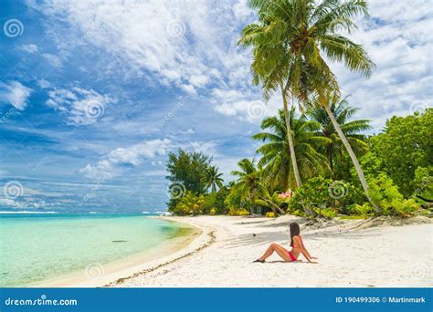 Relaxing Woman Sunbathing Lying In Sand On Beach In Bikini On Bora Bora