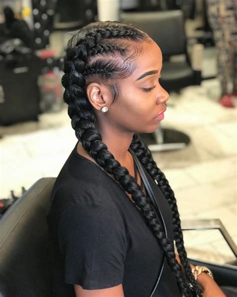 Once you reach the bottom of the head and run out of hair to add, continue the braid as a simple three strand, then secure with a clear elastic. 99 Two Braids and You've Got it Made