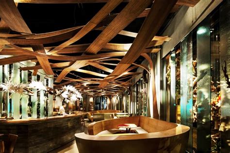 Top 5 Restaurant Interior Designs With Wooden Walls Insertions