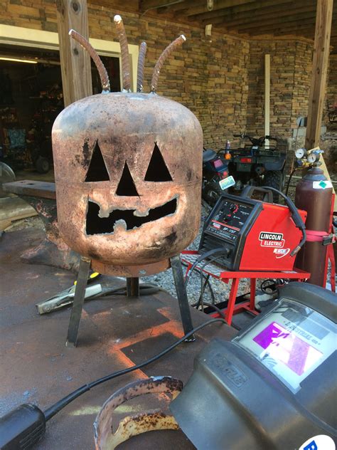 Check out our jack o lantern decor selection for the very best in unique or custom, handmade pieces from our shops. Propane tank Jack-o-lantern | Metal art welded, Metal art, How to make lanterns