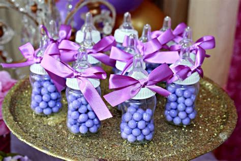 For a classic fairy shower, get a few helium balloons in purple, pink, or white, and cover them in soft tulle, cinching the tulle at the base of each balloon with the extra material hanging down. Purple Baby Shower Party Ideas | Photo 10 of 18 | Catch My Party