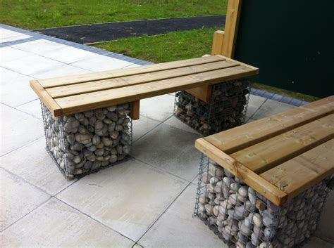 You connect several individual elements and also install a cladding of wooden boards. Gabion Seating | Seating and Planting | Playscheme | York UK