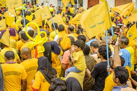 Crowd Of People Wearing Yellow Shirts · Free Stock Photo