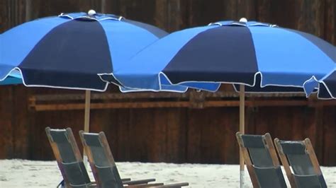 Woman Dies After Being Struck Impaled By Beach Umbrella In Garden City