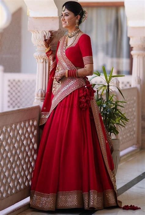 This Red Sabyasachi Lehenga Is The Latest Fad Among Brides And Were Loving It Weddingbazaar