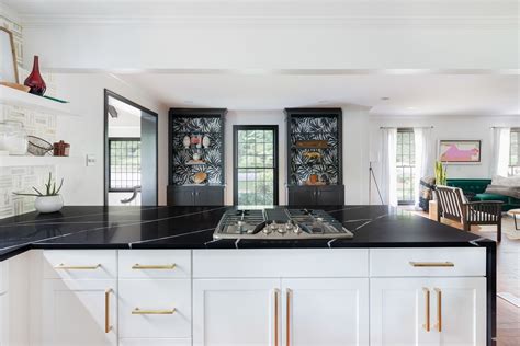 Modern kitchen remodel using Eternal Marquina Quartz | Black granite