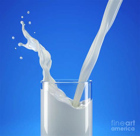 Pouring Milk Into A Glass With Splash Photograph By Leonello Calvetti