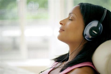 Woman Listening To Music Photograph By Ian Hootonscience Photo Library