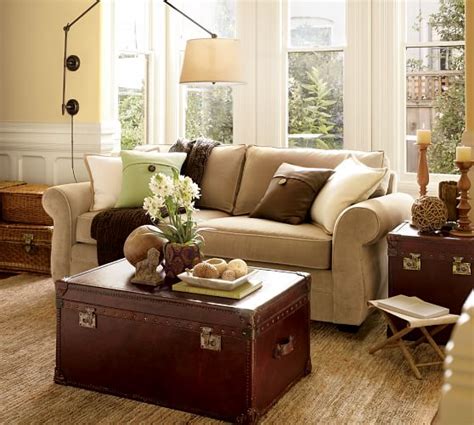 I was in pottery barn recently and asked if they had a sofa that wears well, cleans well, and is good for families with young kids. Pearce Roll Arm Upholstered Sofa | Pottery Barn