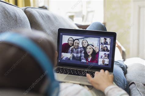 Teenage Girl Video Chatting With Friends On Laptop Screen Stock Image