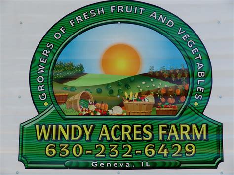 The Sign For Windy Acres Farm In Geneva Illinois Is Painted Green And