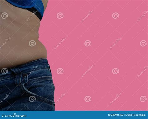 Saggy Belly Folds Of Leather And Fat On The Sides Hanging Over The Waist Of The Jeans A Figure