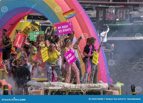 amnesty international boat on the at the gaypride canal parade with boats at amsterdam the
